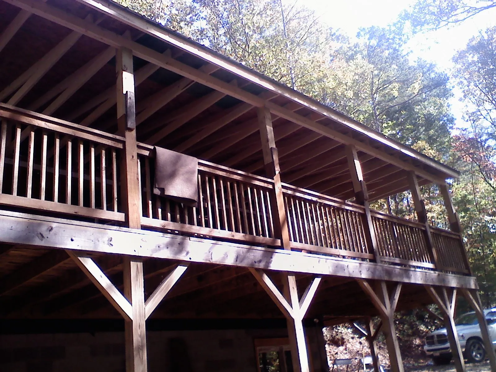 Timber framing under a new elevated porch and deck — Roof Leak Repair in Lost Nation by Roofing Brothers